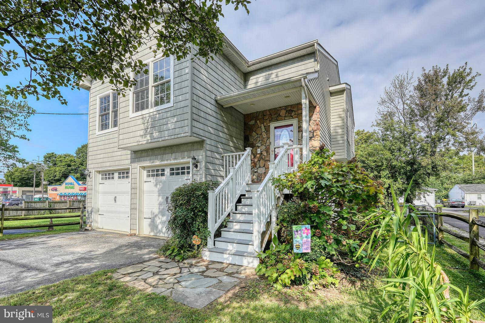 304 South Camp Meade Road Linthicum Heights, MD 21090 - Photo 3 of 43 a front view of a house with a yard