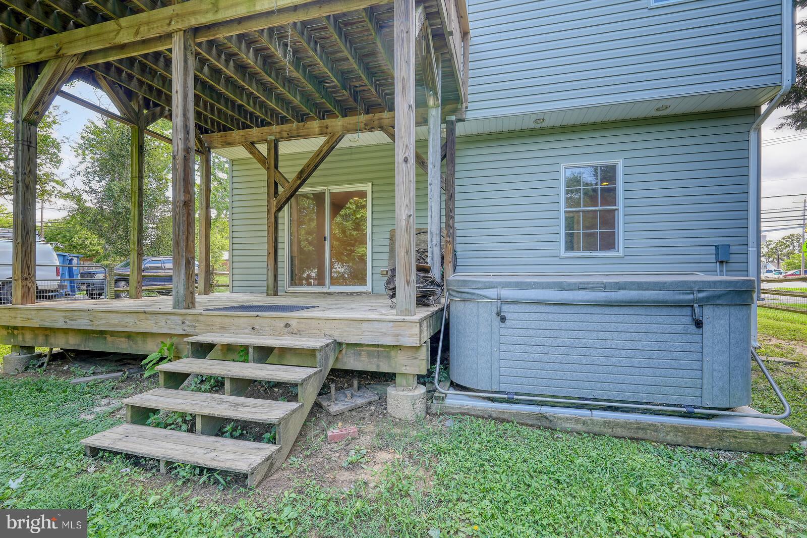 304 South Camp Meade Road Linthicum Heights, MD 21090 - Photo 38 of 43 a view of a small house with a yard and sitting area