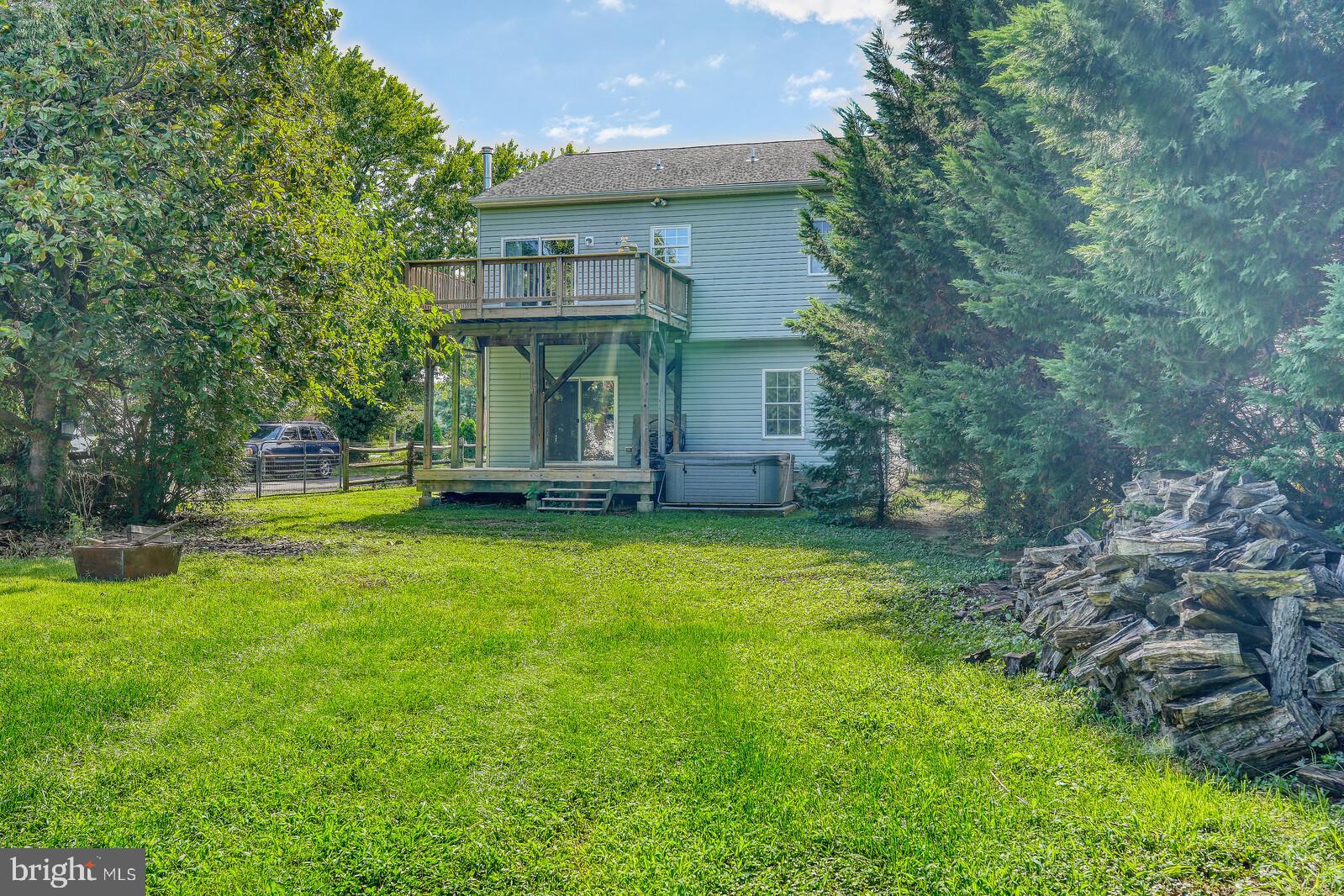304 South Camp Meade Road Linthicum Heights, MD 21090 - Photo 40 of 43 a front view of a house with garden