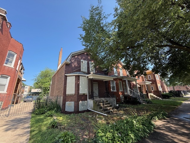 front view of house with a yard