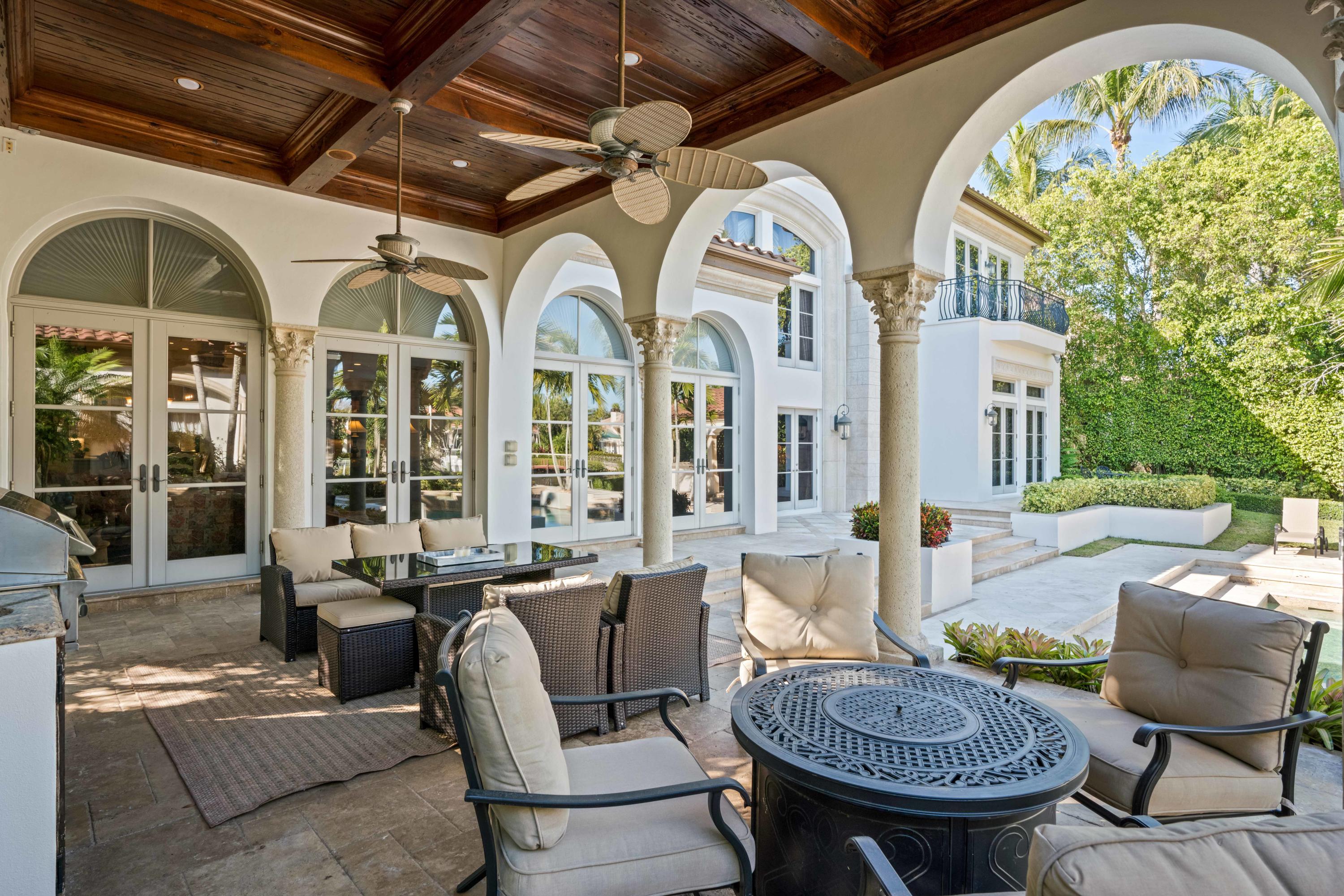 387 Eagle Drive Jupiter, FL 33477 - Photo 45 of 77 Pecky Cypress Box Beam Covered Patio