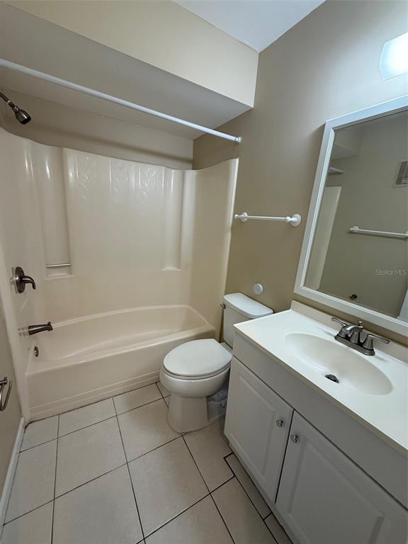 25225 Rampart Boulevard, Unit 1301 Punta Gorda, FL 33983 - Photo 12 of 19 a bathroom with a sink toilet and shower
