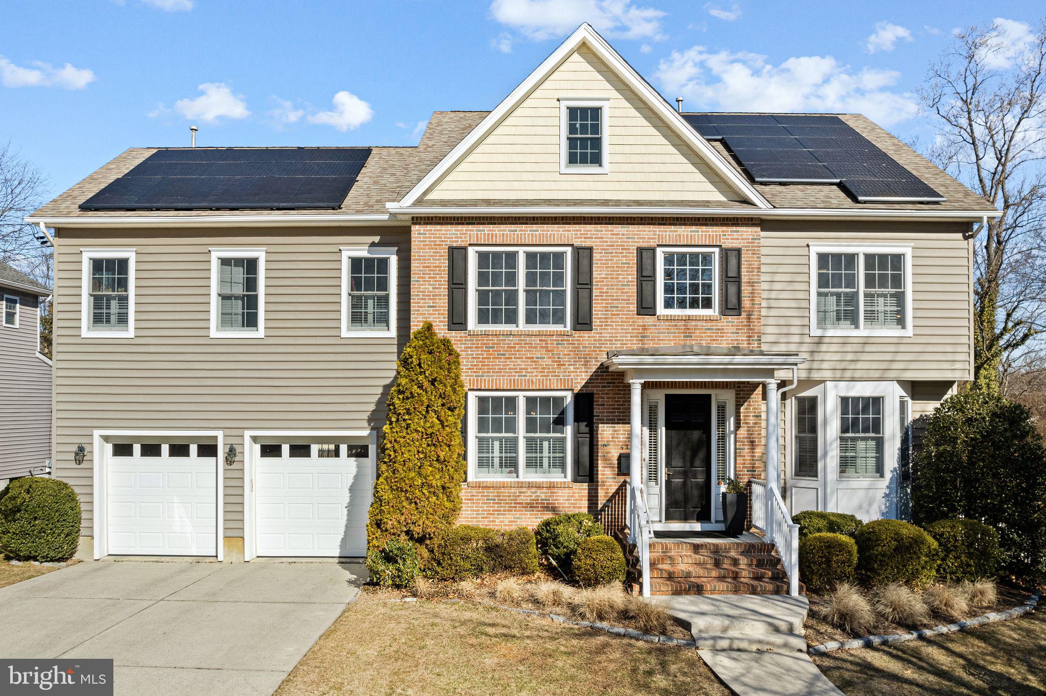 417 East Summit Avenue Haddonfield, NJ 08033 - Photo 1 of 34 a front view of a house