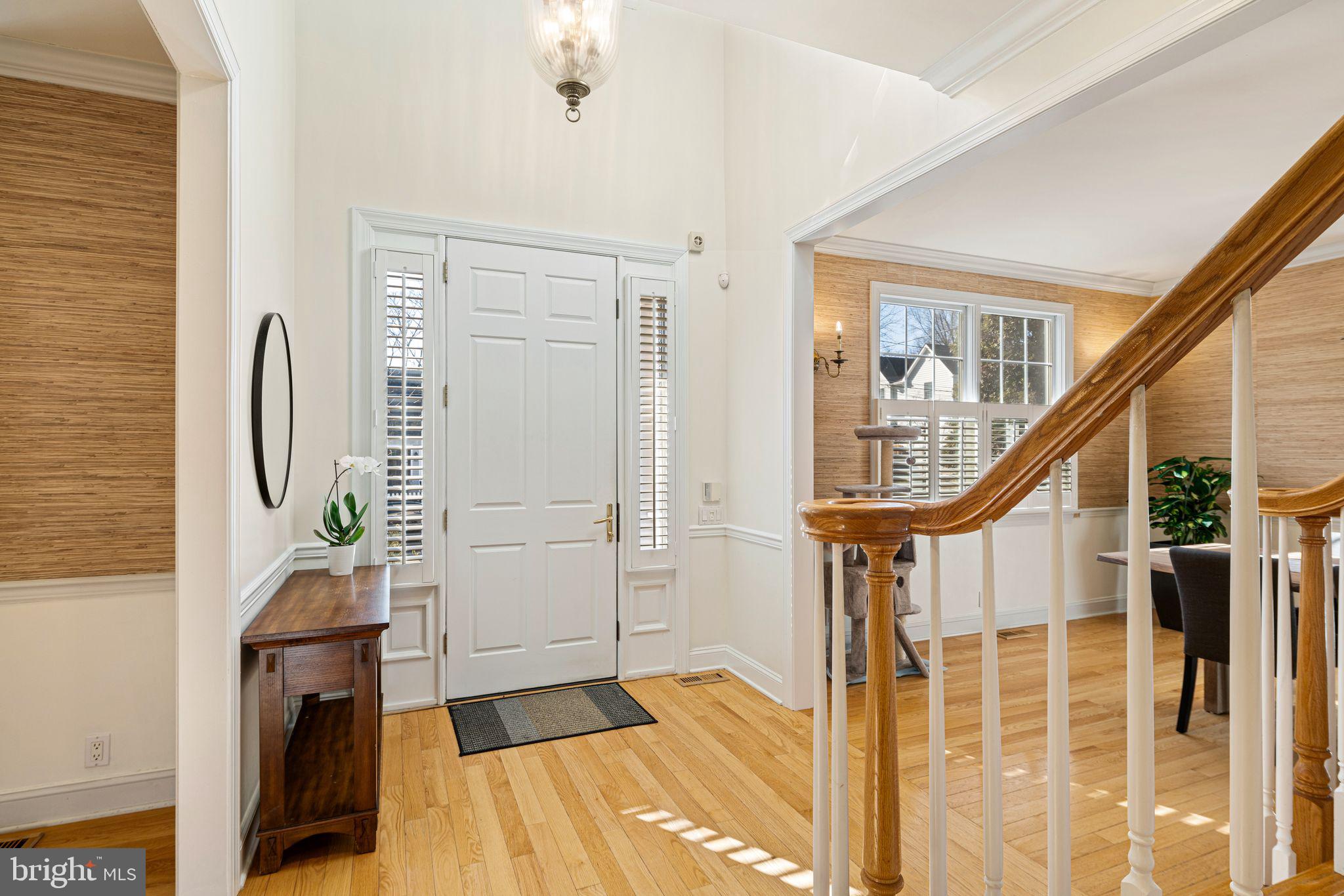 417 East Summit Avenue Haddonfield, NJ 08033 - Photo 11 of 34 a view of an entryway with wooden floor and livingroom