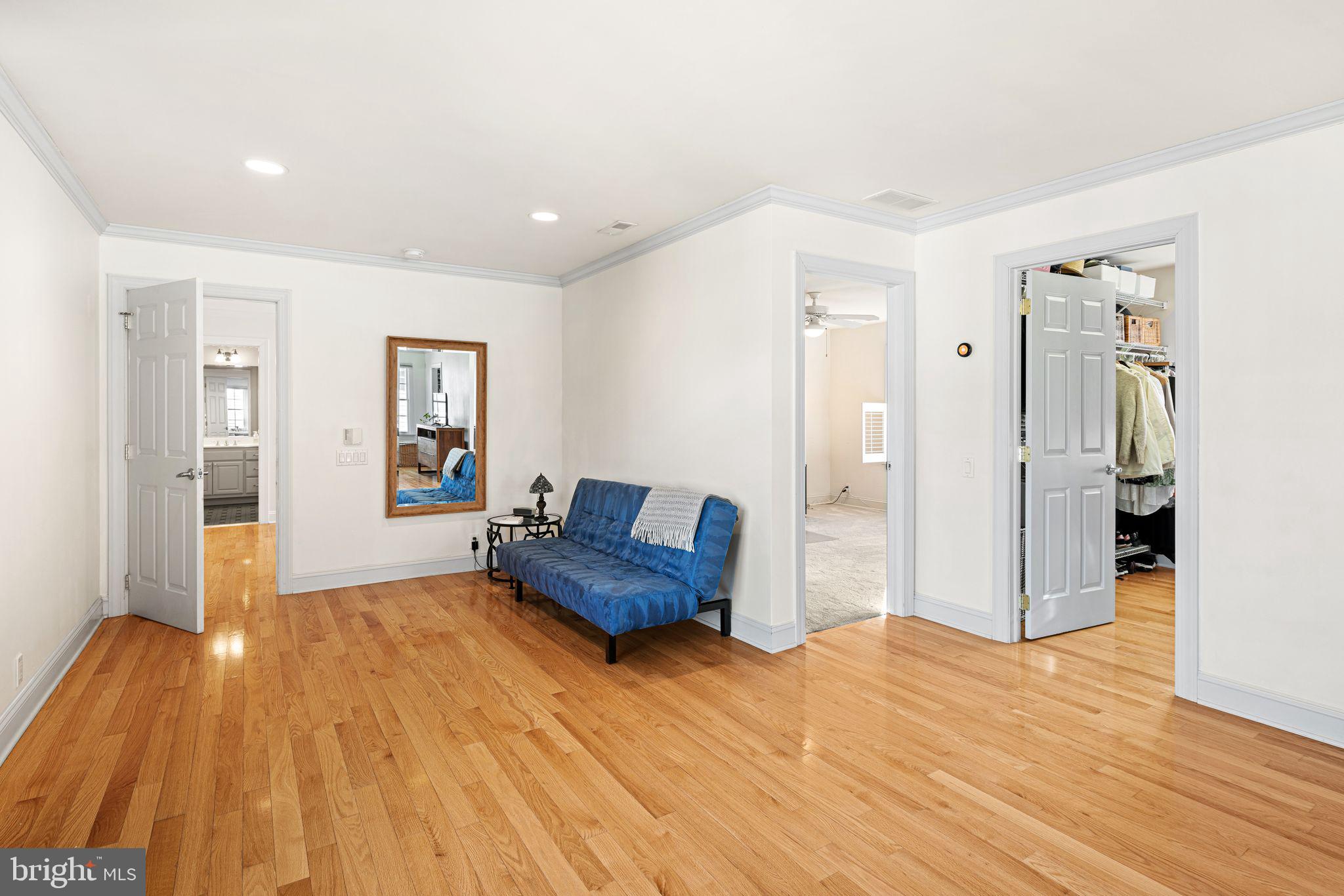 417 East Summit Avenue Haddonfield, NJ 08033 - Photo 17 of 34 a spacious bedroom with a bed and wooden floor