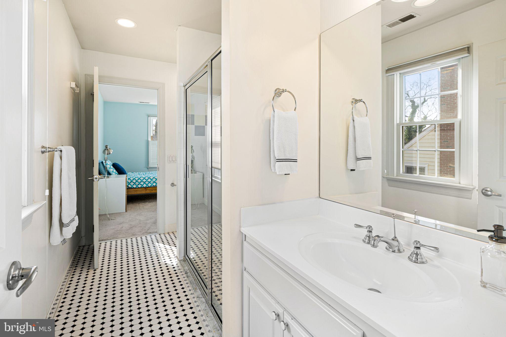417 East Summit Avenue Haddonfield, NJ 08033 - Photo 24 of 34 a en suite bathroom with a sink a mirror and a shower