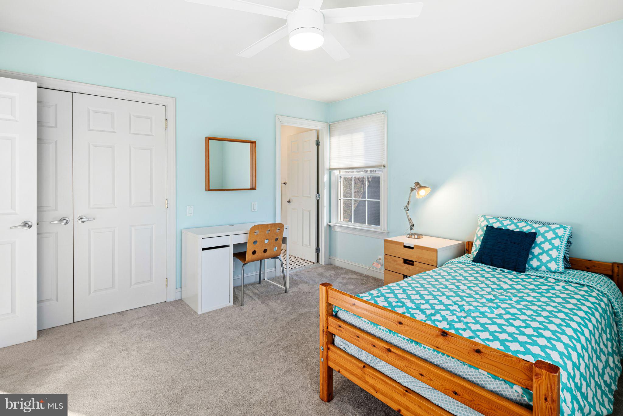 417 East Summit Avenue Haddonfield, NJ 08033 - Photo 26 of 34 a bedroom with two beds and a chandelier