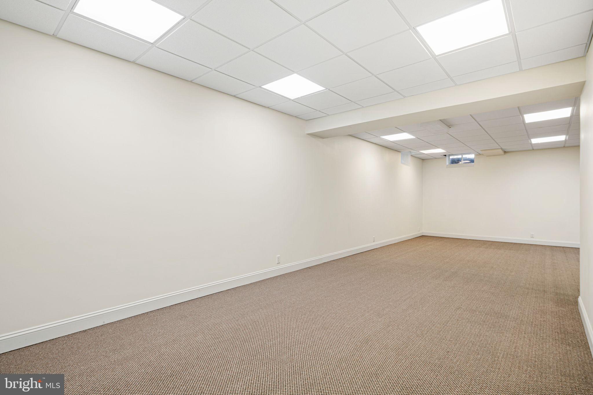 417 East Summit Avenue Haddonfield, NJ 08033 - Photo 31 of 34 an empty room with a empty space and windows