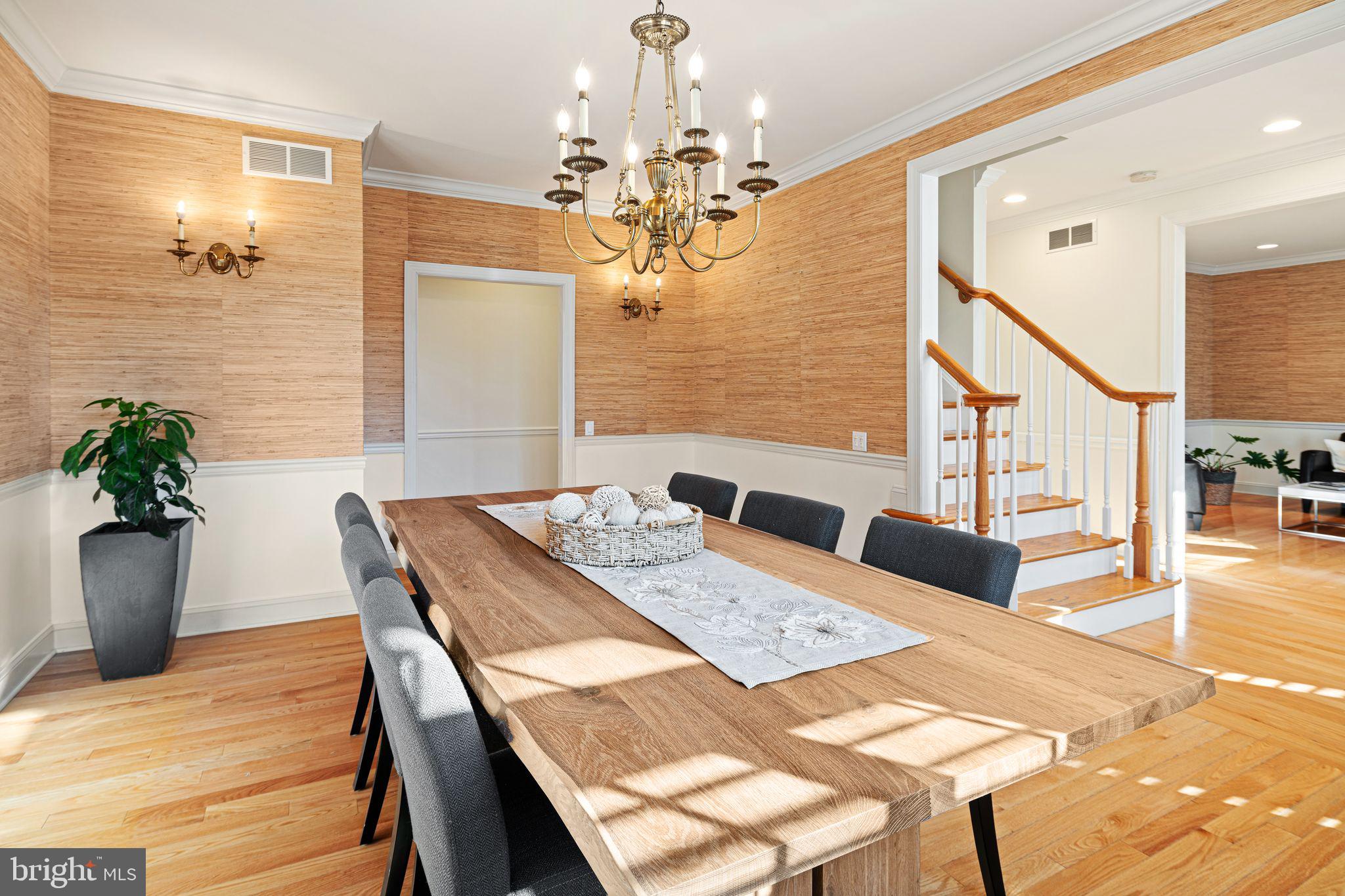 417 East Summit Avenue Haddonfield, NJ 08033 - Photo 7 of 34 a view of a dining room with furniture and wooden floor
