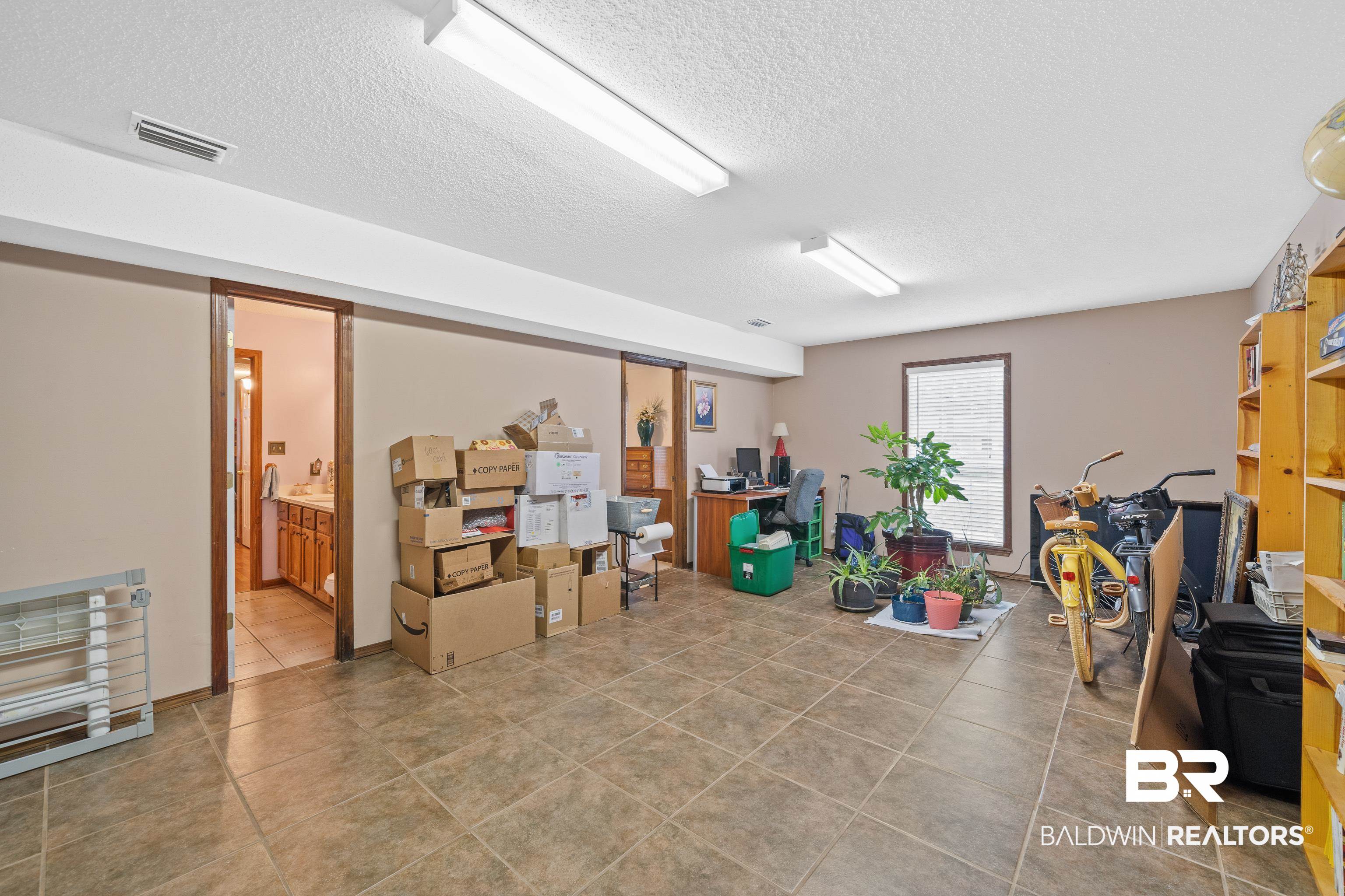 460 Ridgewood Drive Daphne, AL 36526 - Photo 12 of 31 Basement featuring a textured ceiling