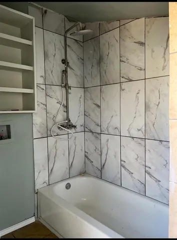 a bathroom with a bathtub