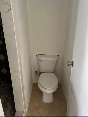 an empty room with a door