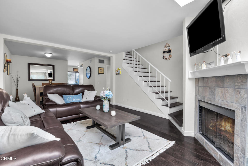 19431 Sherman Way, Unit 6 Reseda, CA 91335 - Photo 16 of 31 a living room with furniture and a flat screen tv
