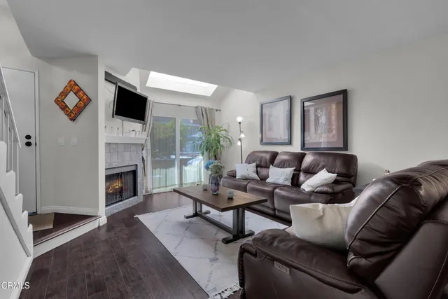 a view of a livingroom with furniture and wooden floor
