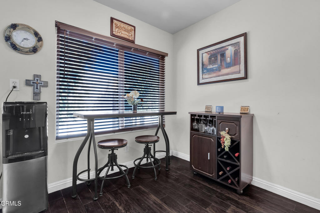 19431 Sherman Way, Unit 6 Reseda, CA 91335 - Photo 22 of 31 a view of a workspace with furniture and a window