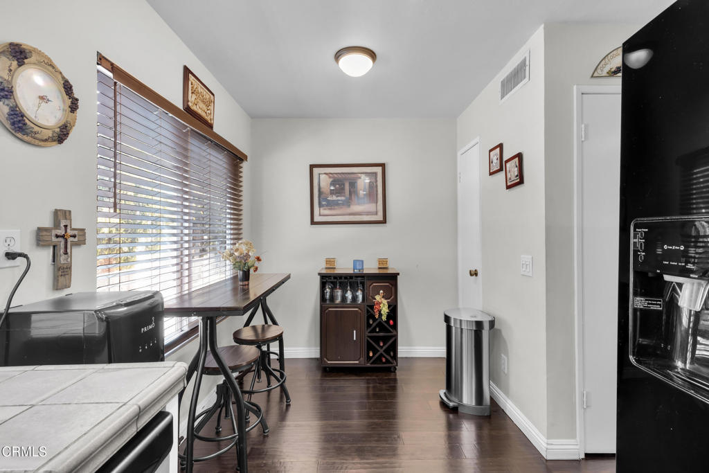 19431 Sherman Way, Unit 6 Reseda, CA 91335 - Photo 23 of 31 a view of a livingroom with furniture and wooden floor