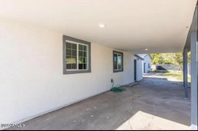 an empty room with windows