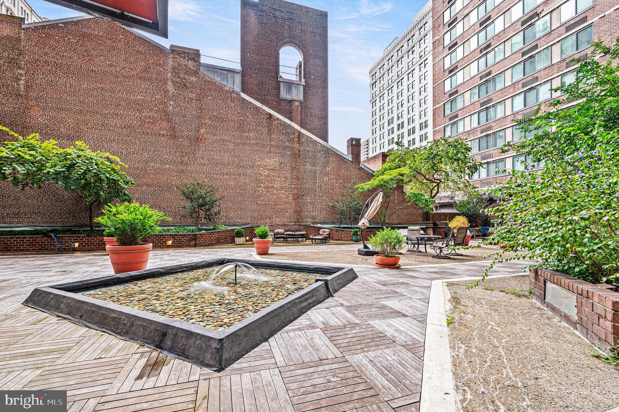 1420 Locust Street, Unit 29R Philadelphia, PA 19102 - Photo 16 of 30 a view of a terrace with sitting area