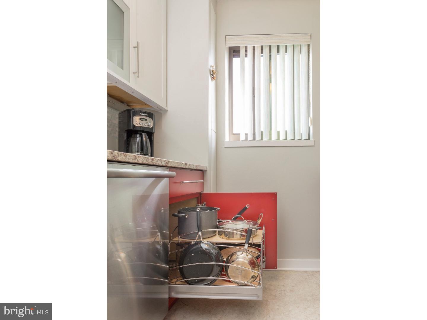 1420 Locust Street, Unit 29R Philadelphia, PA 19102 - Photo 4 of 30 a utility room with dryer and washer