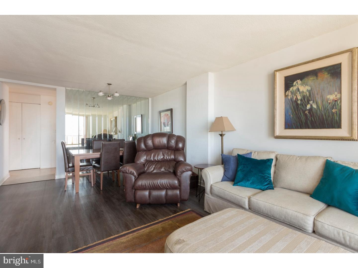 1420 Locust Street, Unit 29R Philadelphia, PA 19102 - Photo 6 of 30 a living room with furniture and wooden floor
