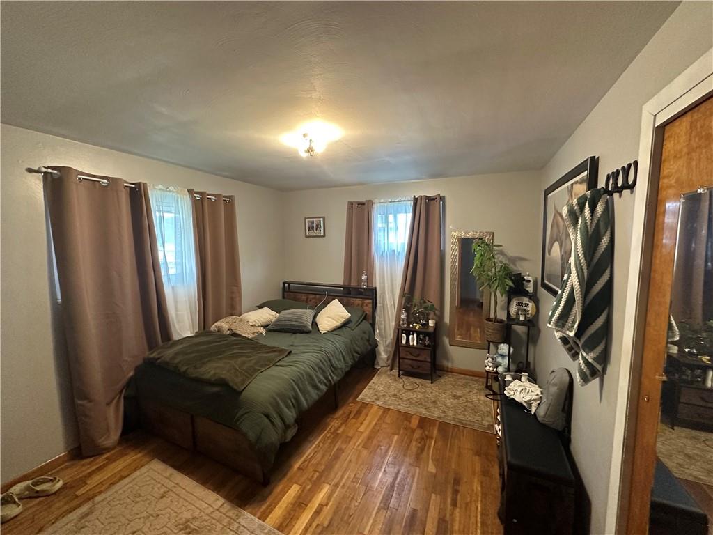 900 State Avenue Coraopolis, PA 15108 - Photo 11 of 19 a bed room with a bed and a mirror