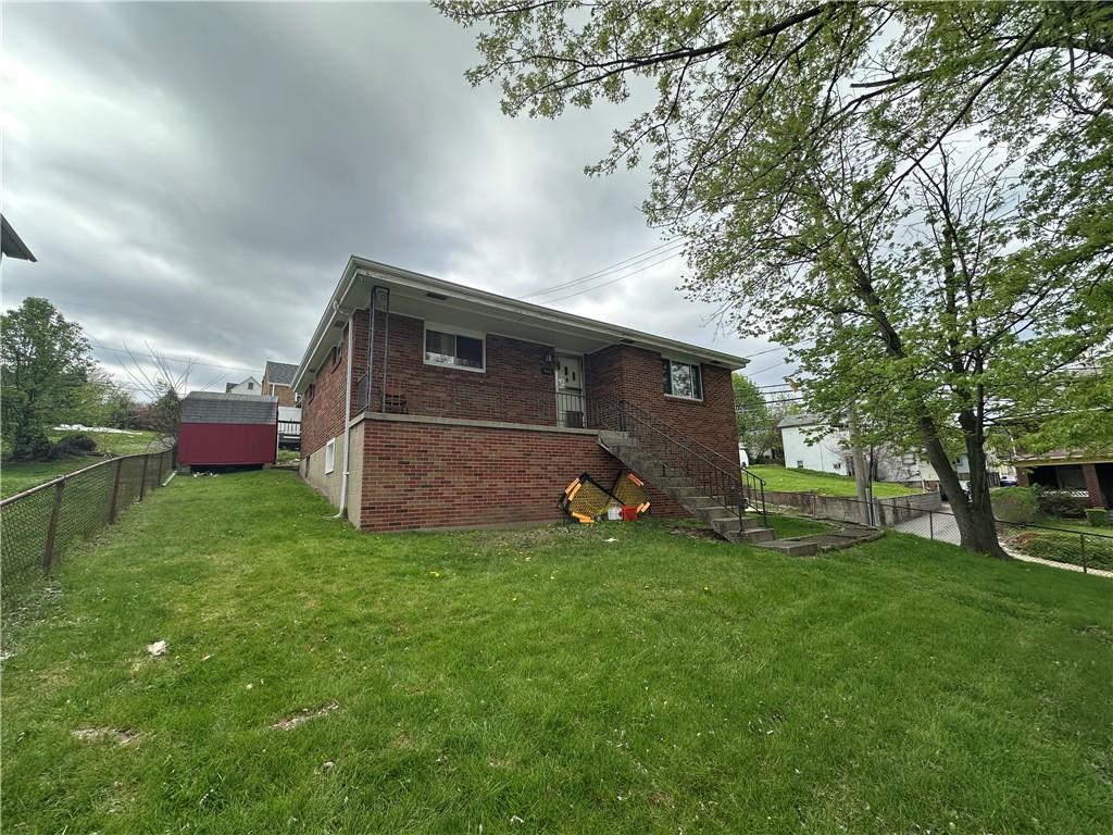900 State Avenue Coraopolis, PA 15108 - Photo 3 of 19 a view of a backyard with a garden and plants