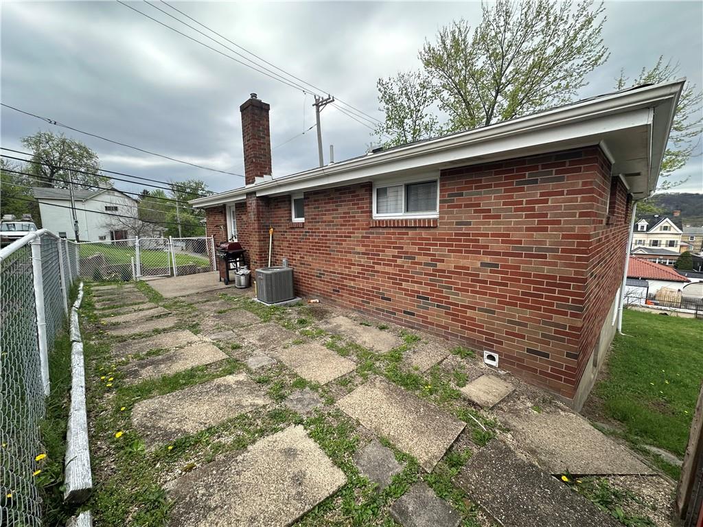 900 State Avenue Coraopolis, PA 15108 - Photo 4 of 19 a front view of a house with garden
