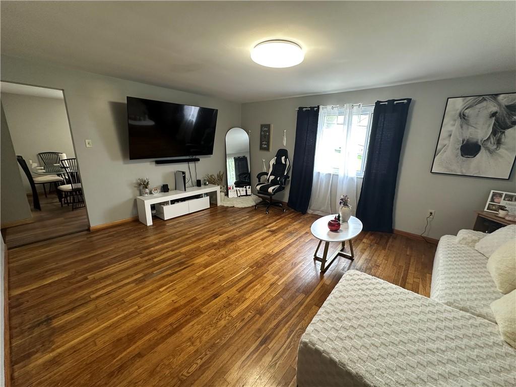 900 State Avenue Coraopolis, PA 15108 - Photo 9 of 19 a bedroom with furniture and a flat screen tv