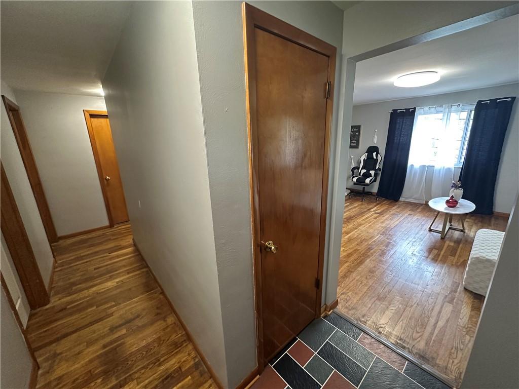900 State Avenue Coraopolis, PA 15108 - Photo 10 of 19 a view of a hallway with wooden floor and closet