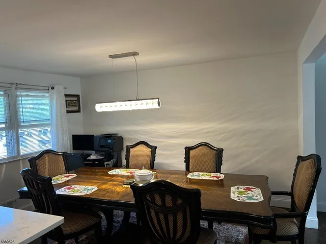 an empty room with wooden floor