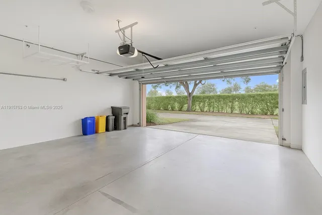 a view of a livingroom with wooden floor and a fireplace