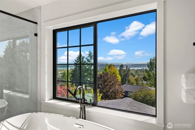 a view of a balcony and a floor to ceiling window