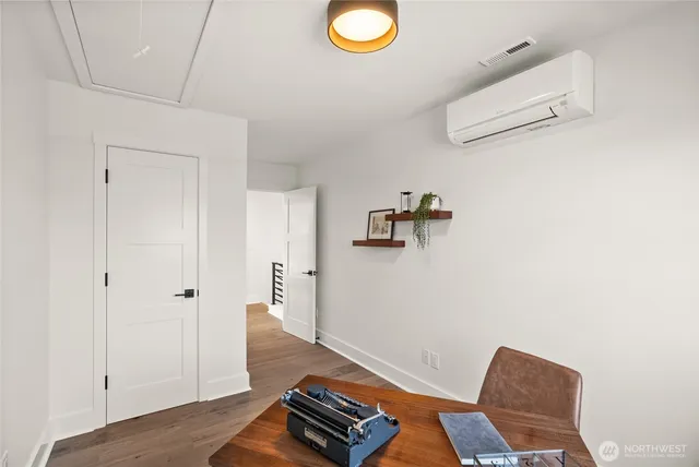 a view of workspace with lounge chair