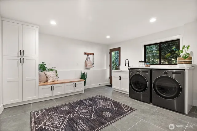 a living room with furniture and a rug