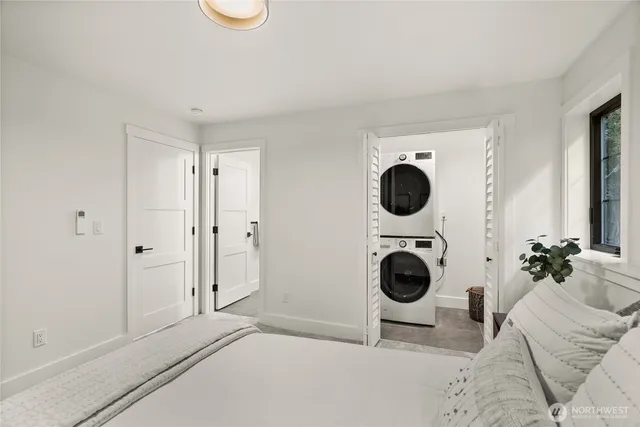 a view of kitchen with sink washer and dryer