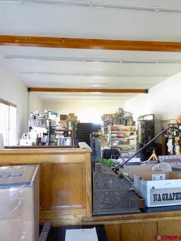 a kitchen with a table and chairs in it