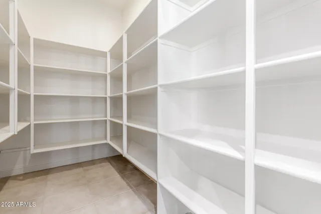 a storage room with wooden floor