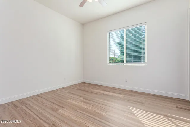 a view of a backyard of the house