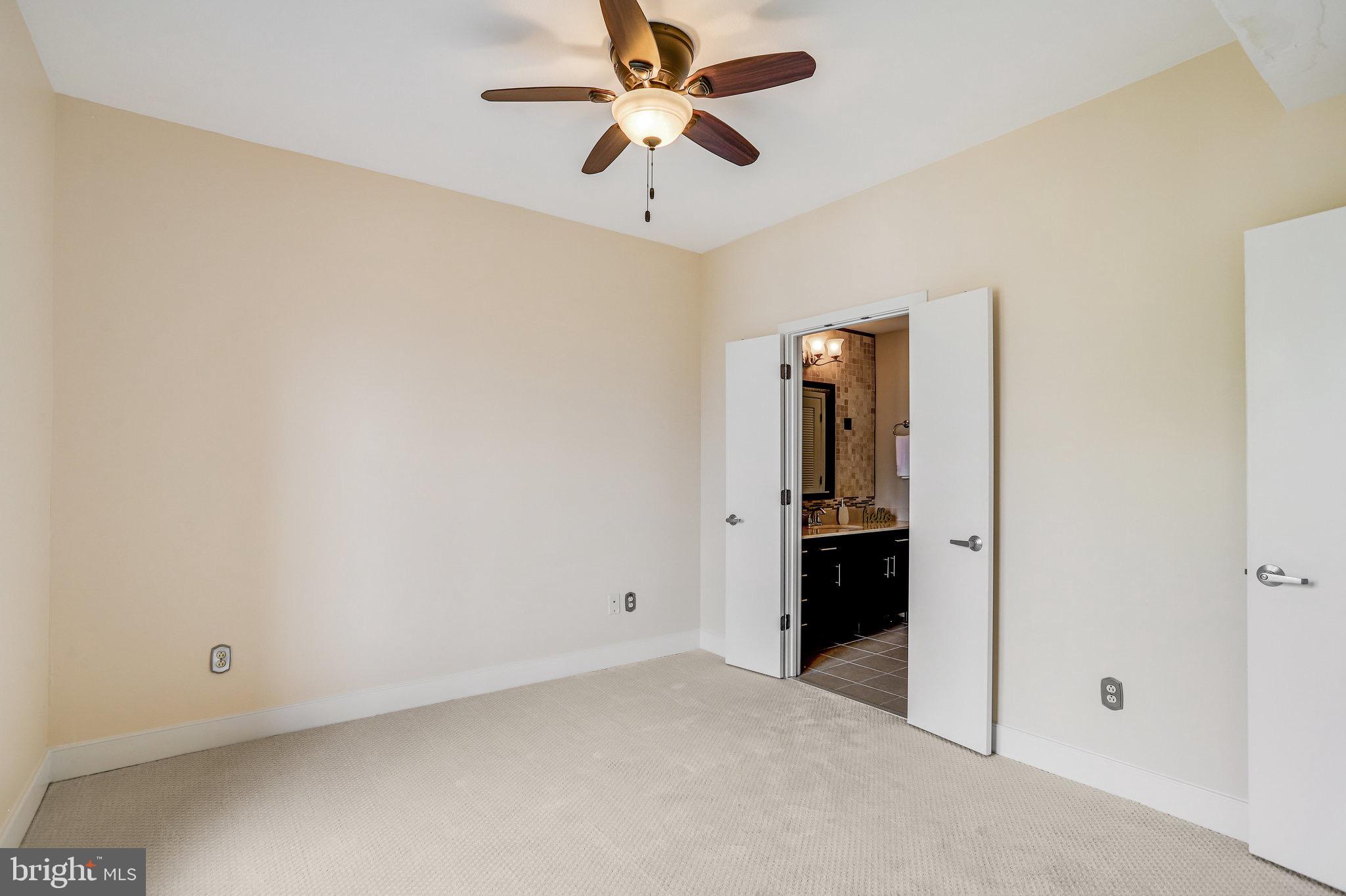 910 M Street Northwest, Unit 516 Washington, DC 20001 - Photo 11 of 29 wooden floor in an empty room