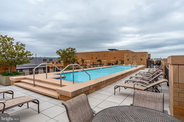 a view of a terrace with chairs