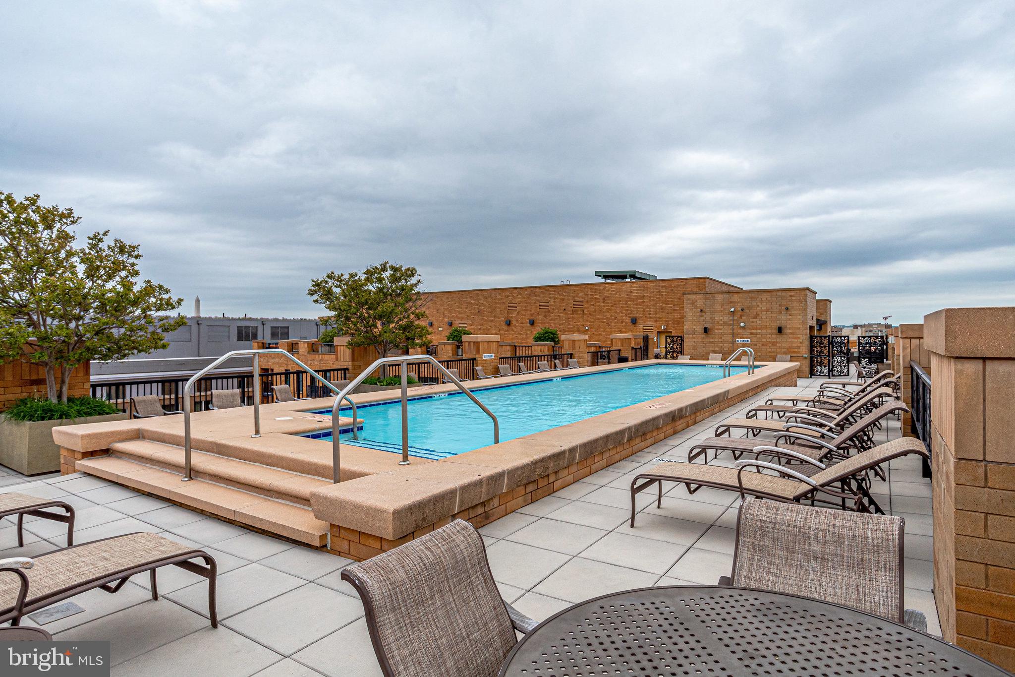 910 M Street Northwest, Unit 516 Washington, DC 20001 - Photo 21 of 29 a view of a terrace with chairs