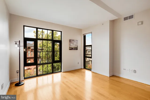 a view of an empty room with a window