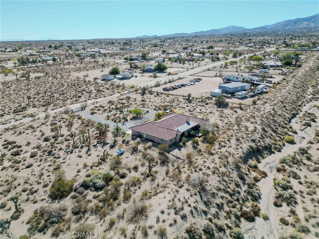 11522 Ponderosa Road Pinon Hills, CA 92372 - Photo 2 of 46 an aerial view of a house with a yard