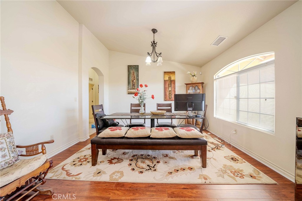 11522 Ponderosa Road Pinon Hills, CA 92372 - Photo 22 of 46 a living room with furniture and a window