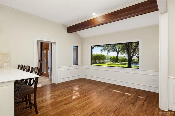 a view of a living room and dining room