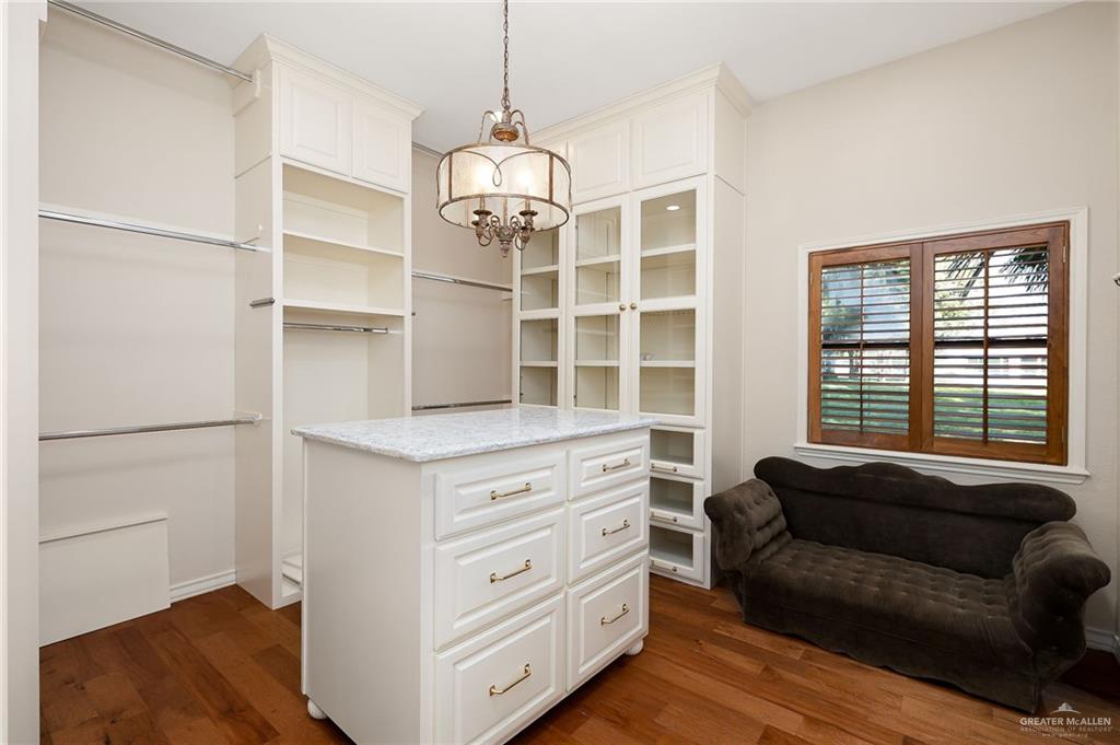 4725 Mile 6 Road McAllen, TX 78504 - Photo 32 of 45 Primary: Her closet with a built in organization system.