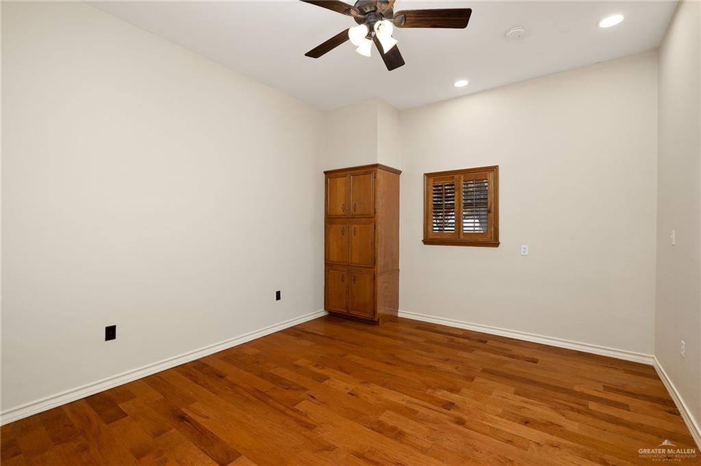 4725 Mile 6 Road McAllen, TX 78504 - Photo 34 of 45 a view of empty room with wooden floor