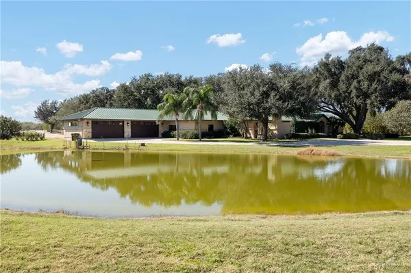a view of a house with a swimming pool