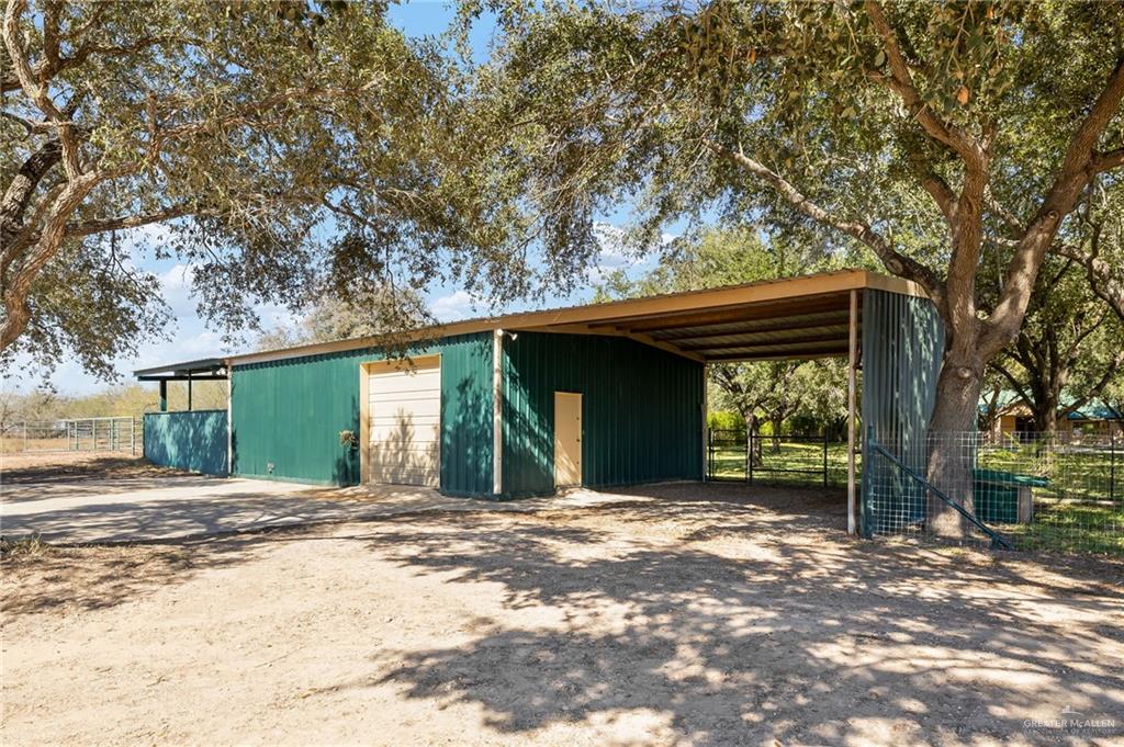 4725 Mile 6 Road McAllen, TX 78504 - Photo 41 of 45 a view of a house with a tree in front of it