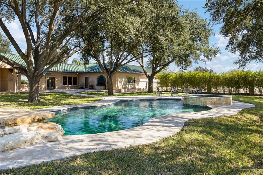 4725 Mile 6 Road McAllen, TX 78504 - Photo 10 of 45 a view of swimming pool and lake view